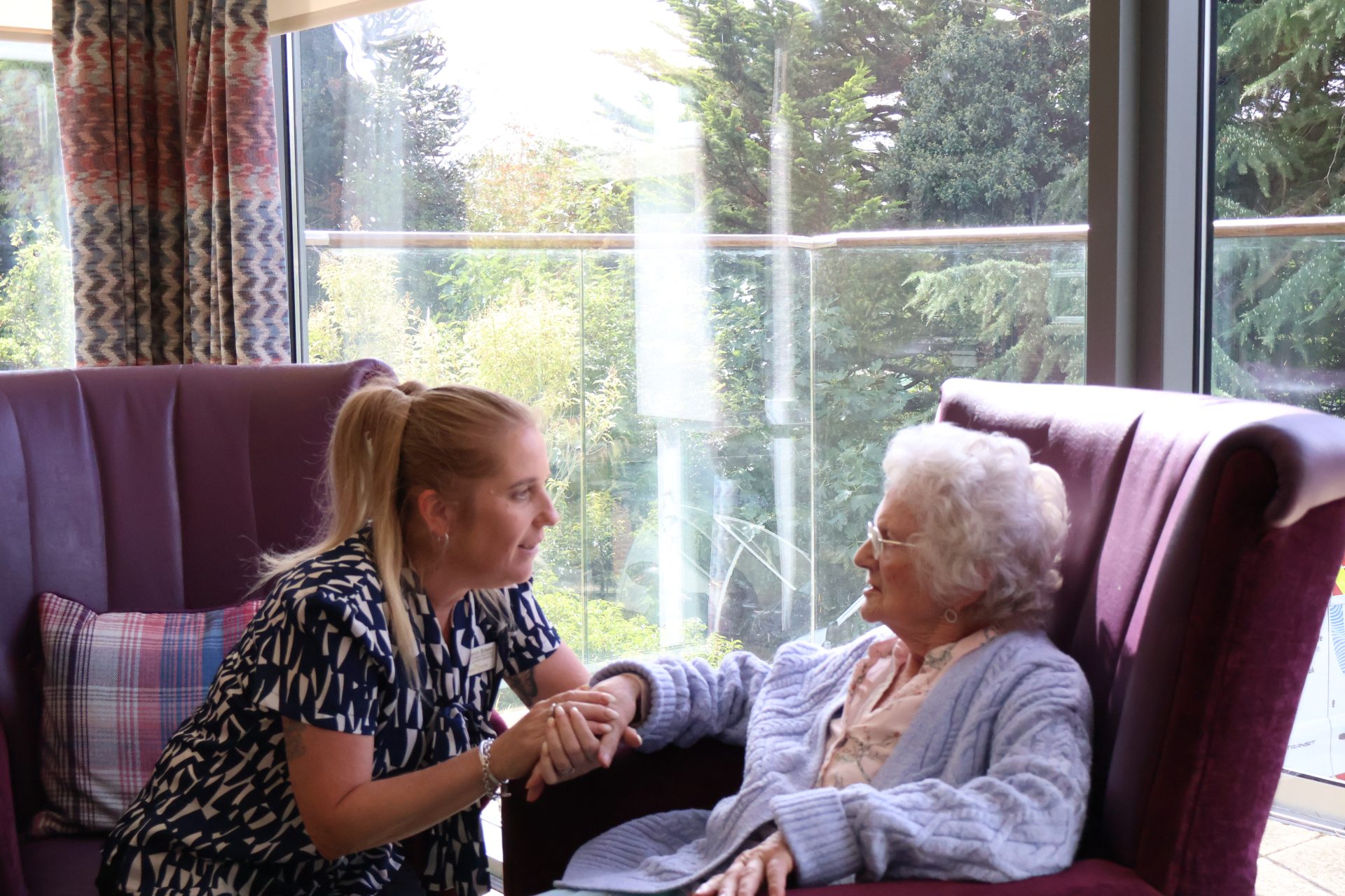 Sharron Park Views Customer Relations manager with a resident.